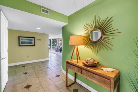 a kitchen with stainless steel appliances a refrigerator and a stove top oven