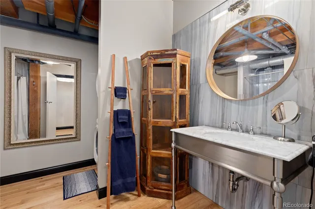 a bathroom with a sink and a mirror