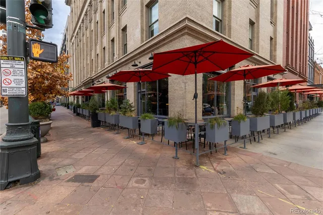 a view of street with sitting area