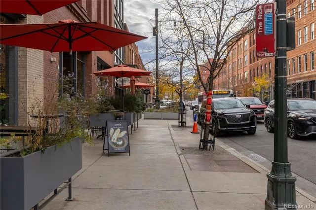 a view of street with sitting area