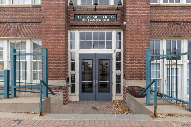 a front view of a building with a glass door