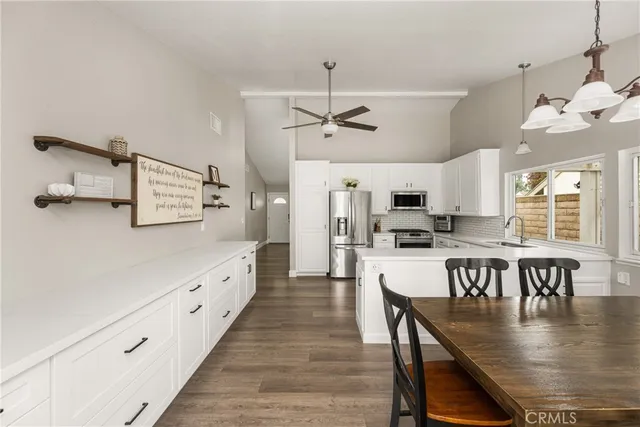 a large kitchen with cabinets