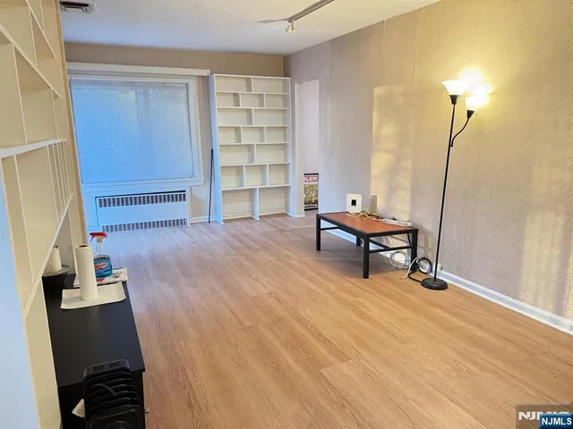 a room with furniture and window