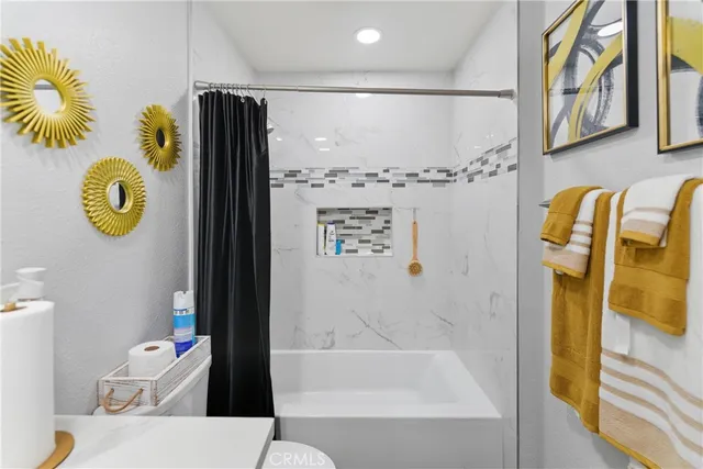 a bathroom with a sink and a shower