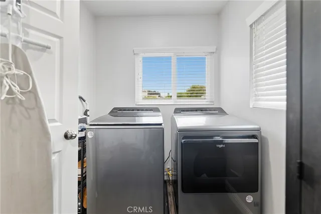 a kitchen with a stove and a refrigerator