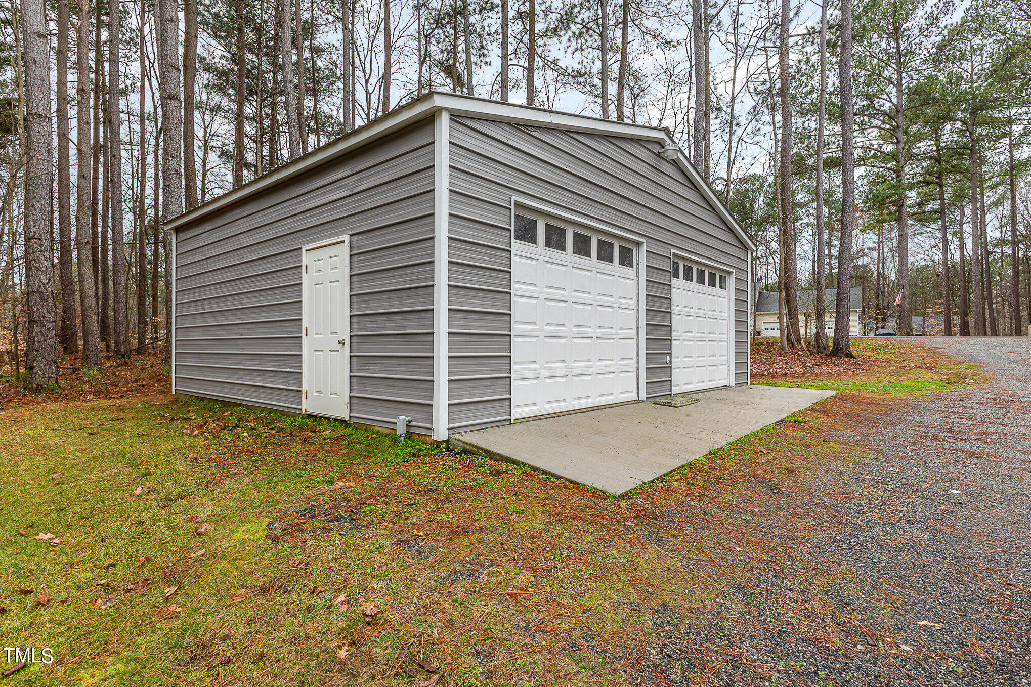 107 Piney Forest Road Roxboro, NC 27574 - Photo 24 of 27 a front view of house with garage