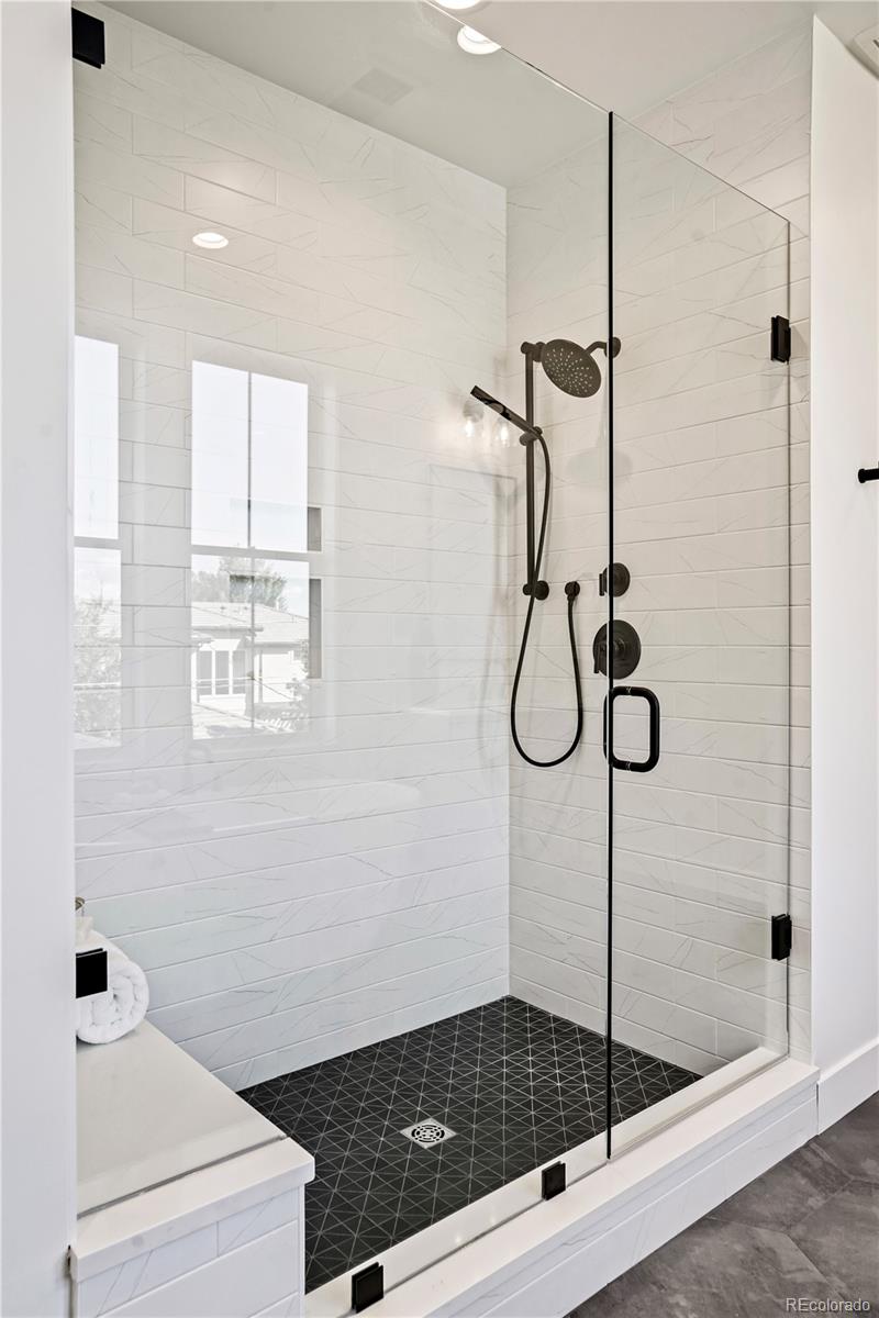 1067 South Cook Street Denver, CO 80209 - Photo 27 of 35 a bathroom with a shower