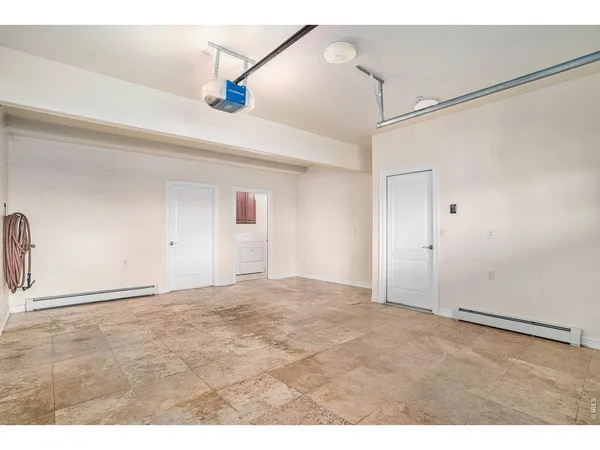 a front view of a building with parking space