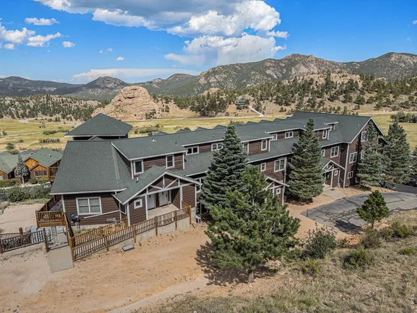 a view of a backyard with a patio