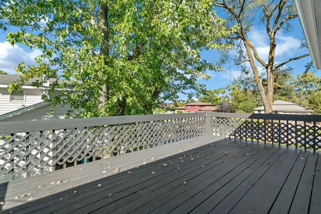 a view of a wooden roof with a bench