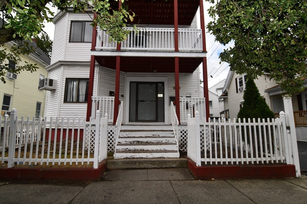 112 Johnson Street Lynn, MA 01902 - Photo 3 of 28 front view of a house
