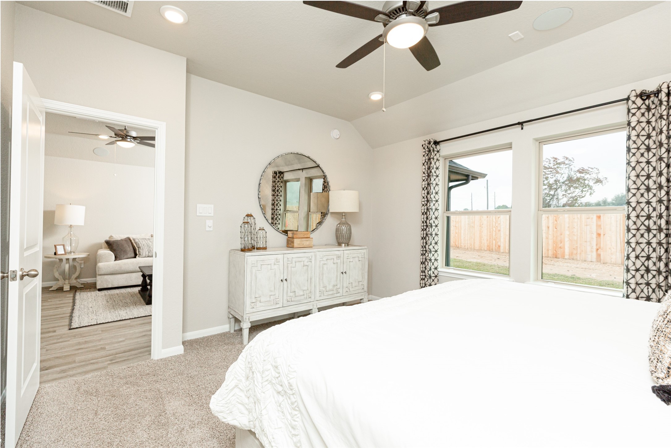 19555 Montgomery Rdg Way Montgomery, TX 77316 - Photo 18 of 21 Another perspective unveils a comprehensive view of the serenity and comfort this primary suite offers. Sample photo of completed home with similar floor plan. As-built interior colors and selections may vary.