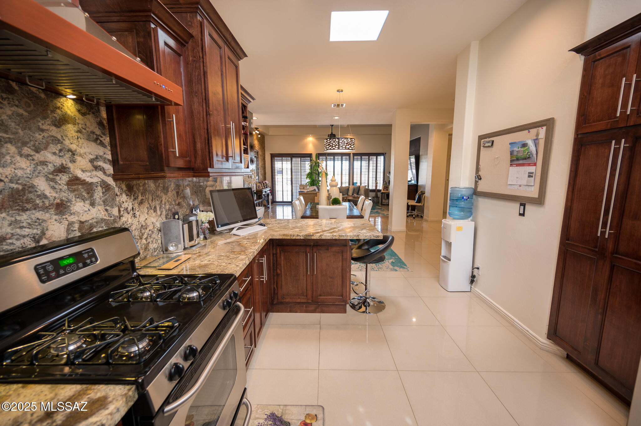 331 Via Bella Donna Rio Rico, AZ 85648 - Photo 9 of 46 a kitchen with stainless steel appliances a stove a sink and a refrigerator