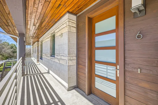 a view of outdoor space with wooden floor and deck