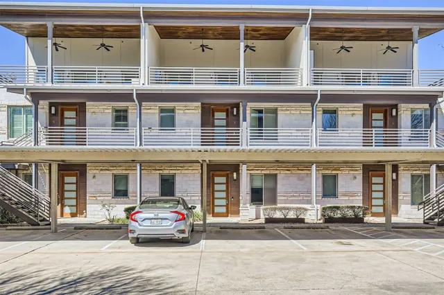 a car parked in front of a building