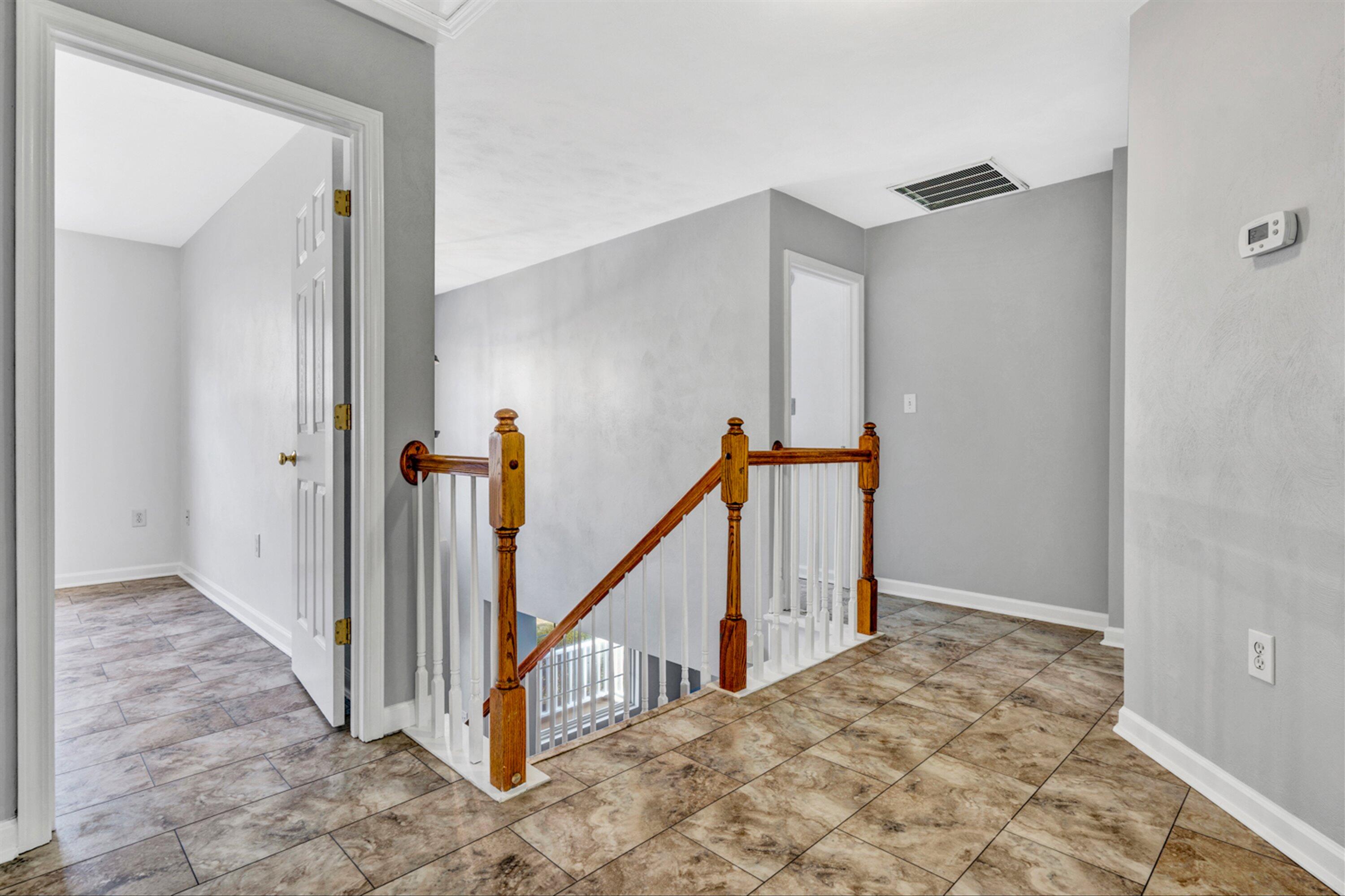 4218 Daugherty Road Salem, VA 24153 - Photo 18 of 35 a view of a hallway with staircase