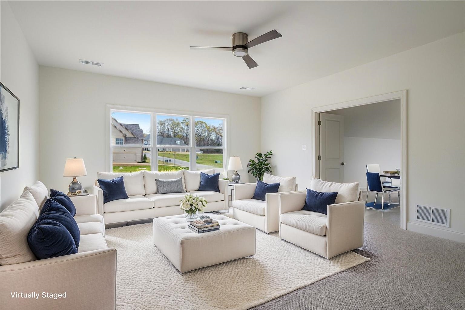 12600 Miss Cloud Road Collierville, TN 38017 - Photo 26 of 40 Carpeted living area featuring a ceiling fan
