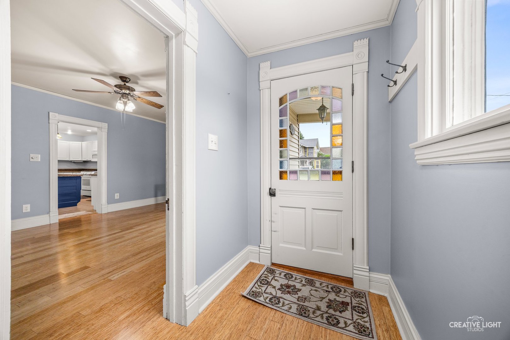 209 North Shabbona Road Shabbona, IL 60550 - Photo 3 of 25 a view of entryway with wooden floor and a rug