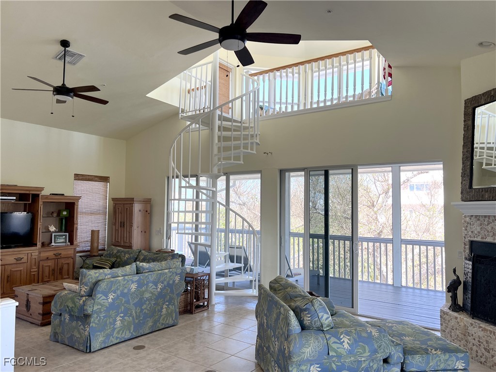 621 Rum Road Captiva, FL 33924 - Photo 11 of 50 a living room with furniture and a flat screen tv