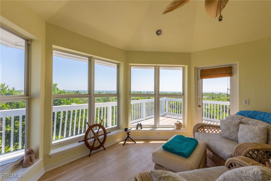 621 Rum Road Captiva, FL 33924 - Photo 28 of 50 a living room with furniture and a large window