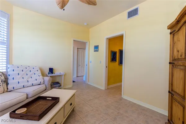 a living room with furniture and a couch