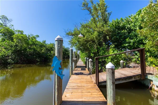 a view of a lake with a deck and a lake view