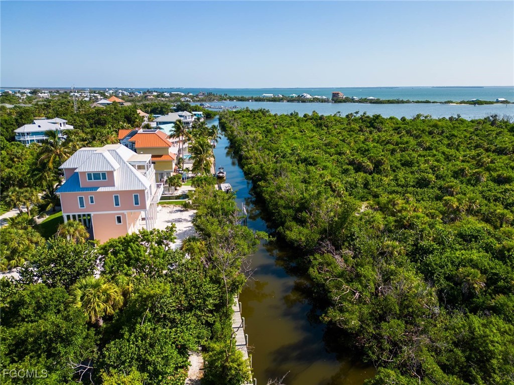 621 Rum Road Captiva, FL 33924 - Photo 5 of 50 an aerial view of a house with a garden