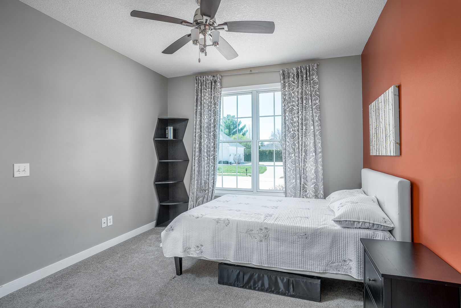 3404 77th St Court Moline, IL 61265 - Photo 15 of 37 a bedroom with a bed and a chandelier