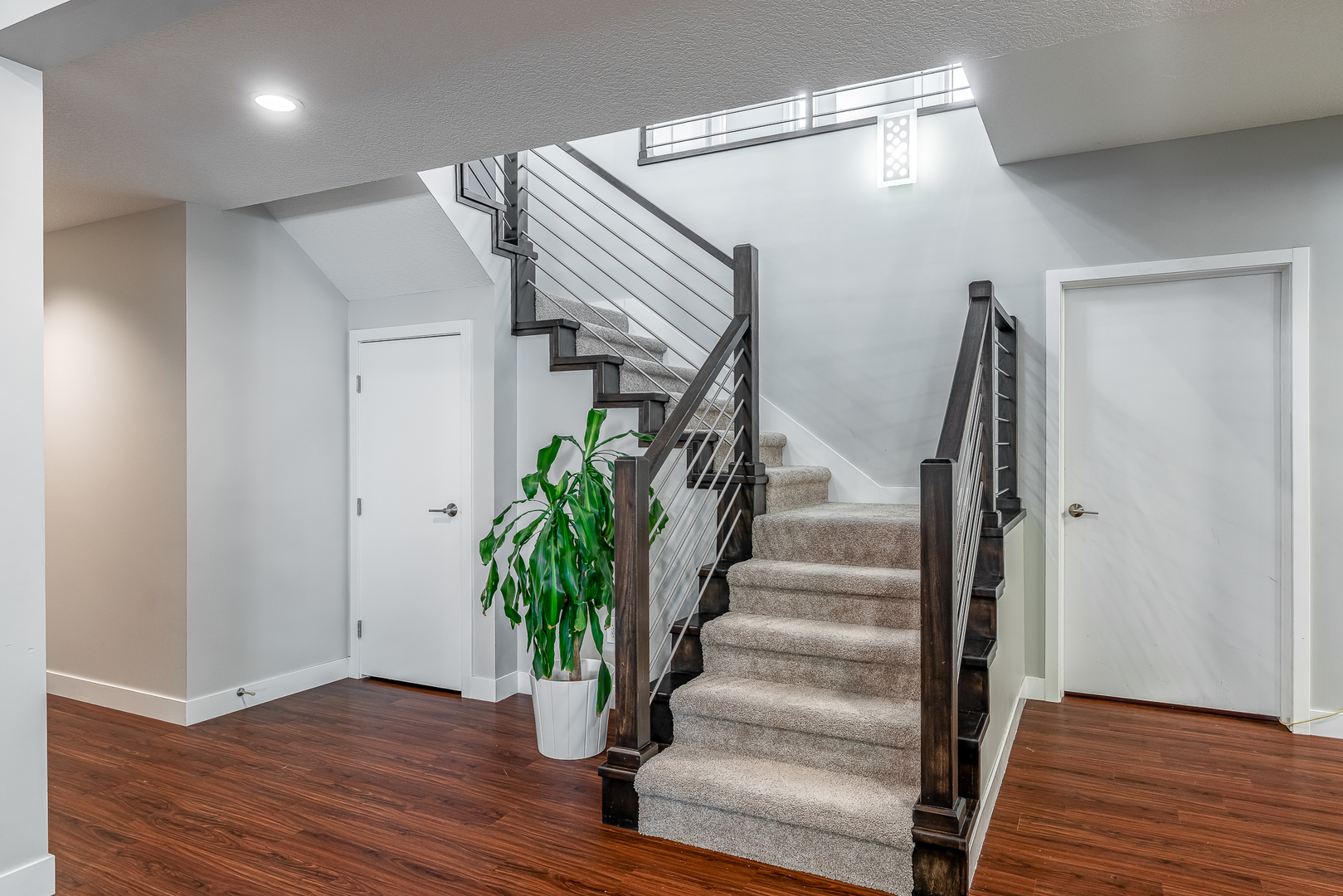 3404 77th St Court Moline, IL 61265 - Photo 23 of 37 a view of entryway with stairs and wooden floor