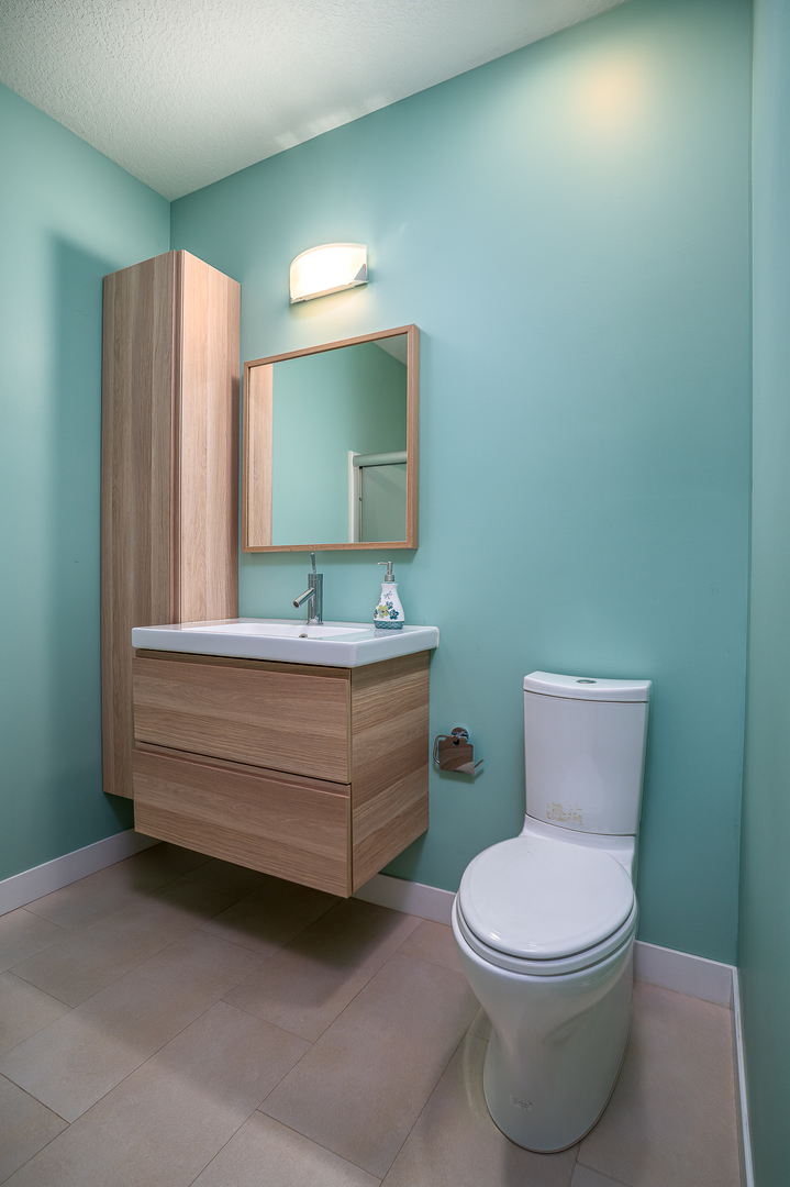 3404 77th St Court Moline, IL 61265 - Photo 28 of 37 a bathroom with a toilet sink and mirror