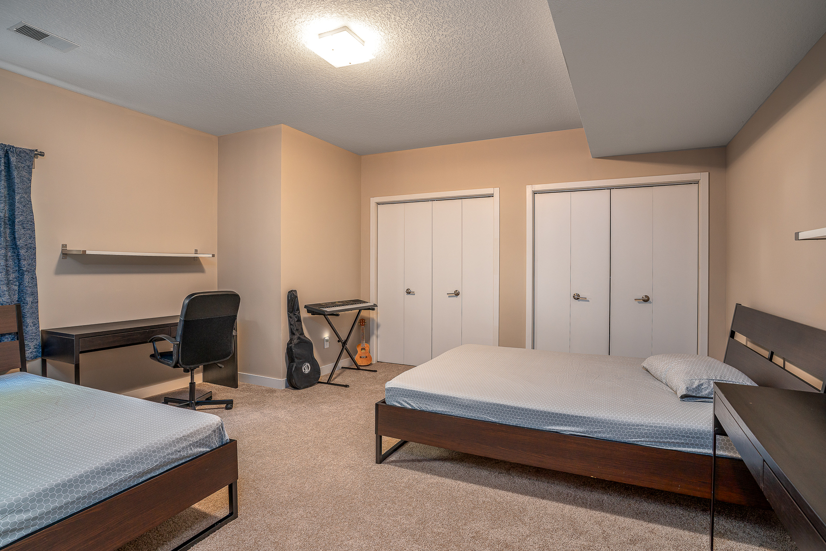 3404 77th St Court Moline, IL 61265 - Photo 30 of 37 a bedroom with a bed and large windows