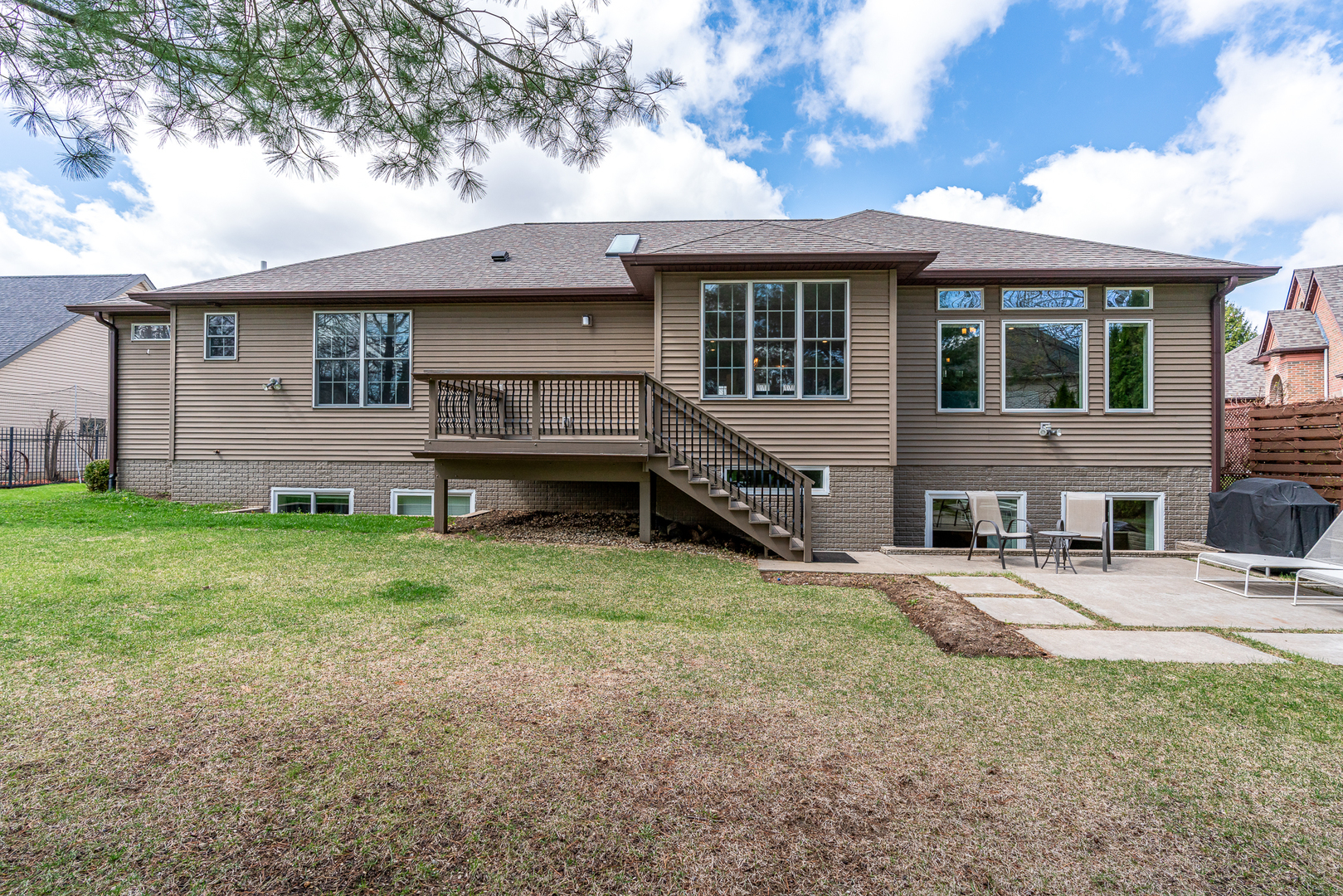3404 77th St Court Moline, IL 61265 - Photo 33 of 37 a view of a house with a yard and sitting area