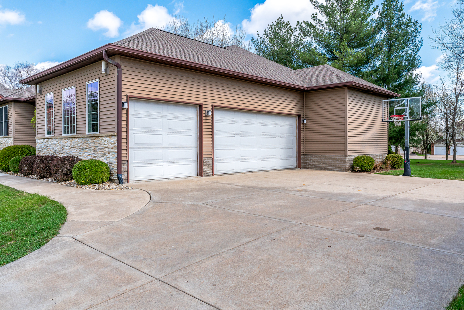 3404 77th St Court Moline, IL 61265 - Photo 35 of 37 a front view of a house with a yard and garage