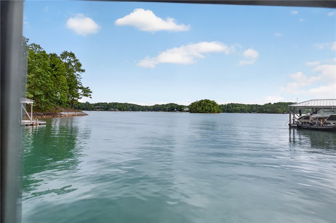 304 Lakeside Drive Seneca, SC 29672 - Photo 49 of 49 A tranquil lake view unfolds, showcasing expansive waters and a private boat dock.