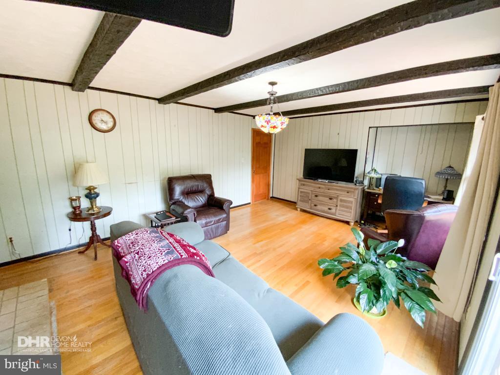 5405 Mountain Road Broad Run, VA 20137 - Photo 43 of 123 Family Room with Exposed Beams and Fireplace