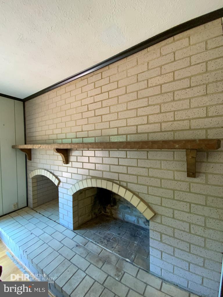 5405 Mountain Road Broad Run, VA 20137 - Photo 45 of 123 Family Room with Exposed Beams and Fireplace