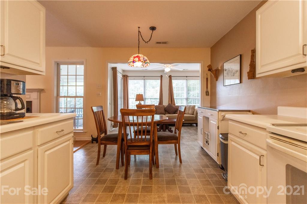67 Rolling Meadow Road Fletcher, NC 28732 - Photo 14 of 39 a view of a dining room with furniture and window
