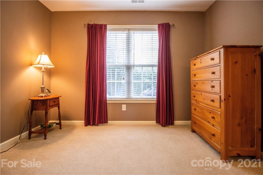67 Rolling Meadow Road Fletcher, NC 28732 - Photo 17 of 39 a view of a room with furniture and a window