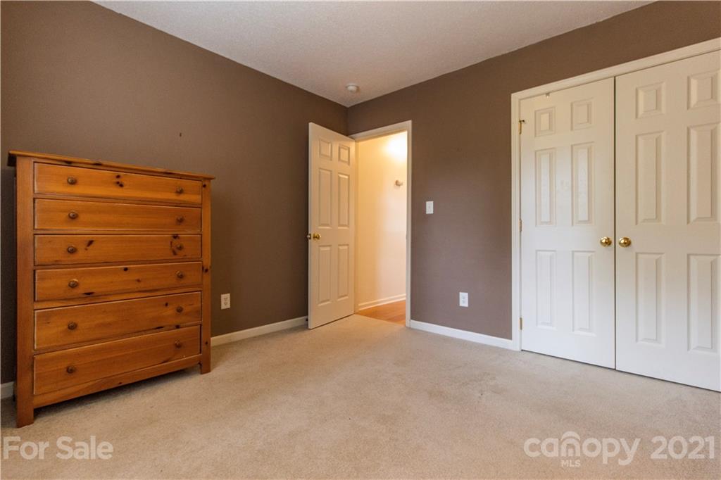 67 Rolling Meadow Road Fletcher, NC 28732 - Photo 18 of 39 a view of an empty room with cabinet and a cabinet