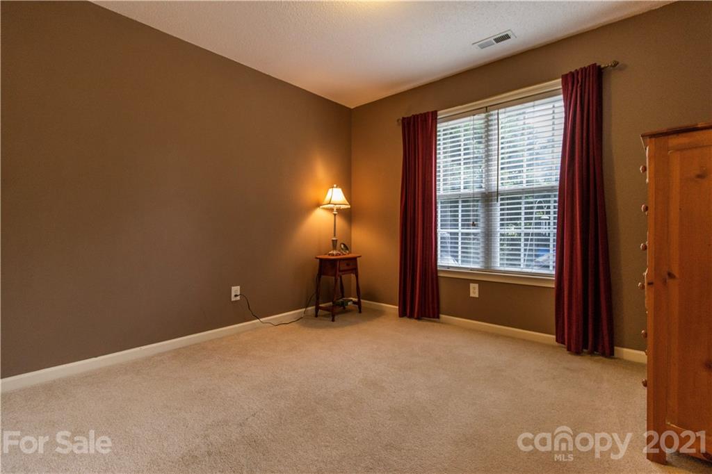 67 Rolling Meadow Road Fletcher, NC 28732 - Photo 19 of 39 a view of an empty room with a window
