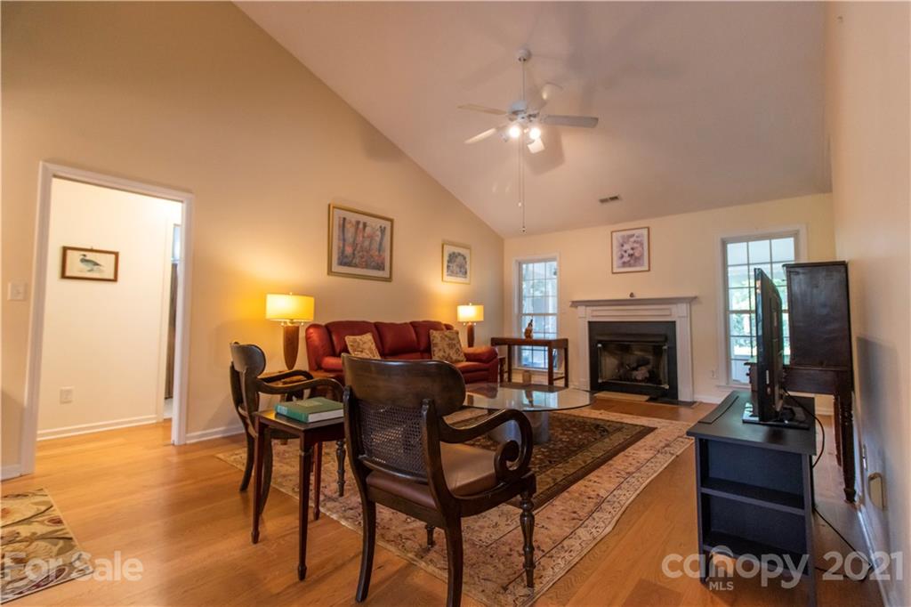 67 Rolling Meadow Road Fletcher, NC 28732 - Photo 3 of 39 a living room with furniture and a fireplace