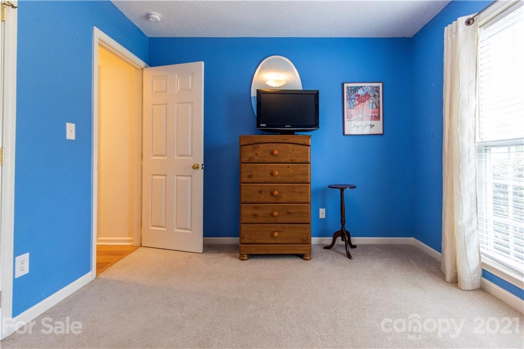 67 Rolling Meadow Road Fletcher, NC 28732 - Photo 21 of 39 an empty room with furniture and a window