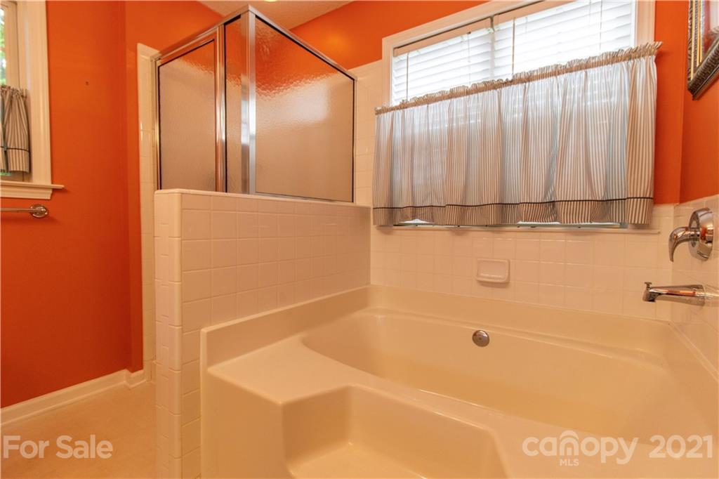 67 Rolling Meadow Road Fletcher, NC 28732 - Photo 27 of 39 a bathroom with a shower