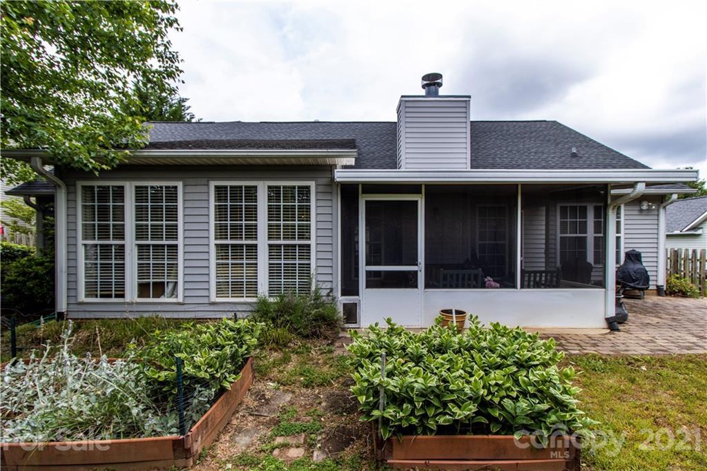 67 Rolling Meadow Road Fletcher, NC 28732 - Photo 36 of 39 a front view of a house with a yard