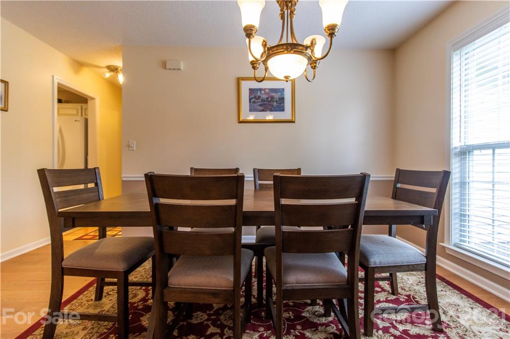 67 Rolling Meadow Road Fletcher, NC 28732 - Photo 7 of 39 a view of a dining room with furniture and window
