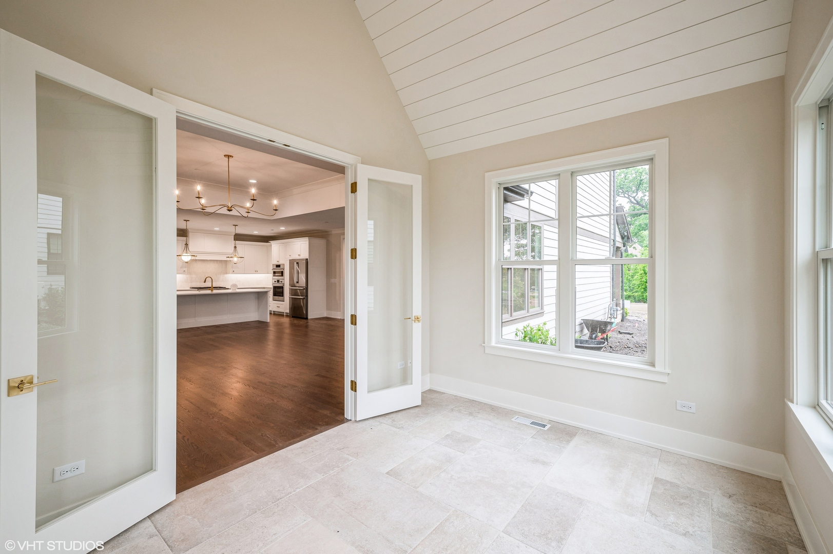 5903 Timber Trails Boulevard Western Springs, IL 60558 - Photo 11 of 30 a view of a hallway with wooden floor and a kitchen