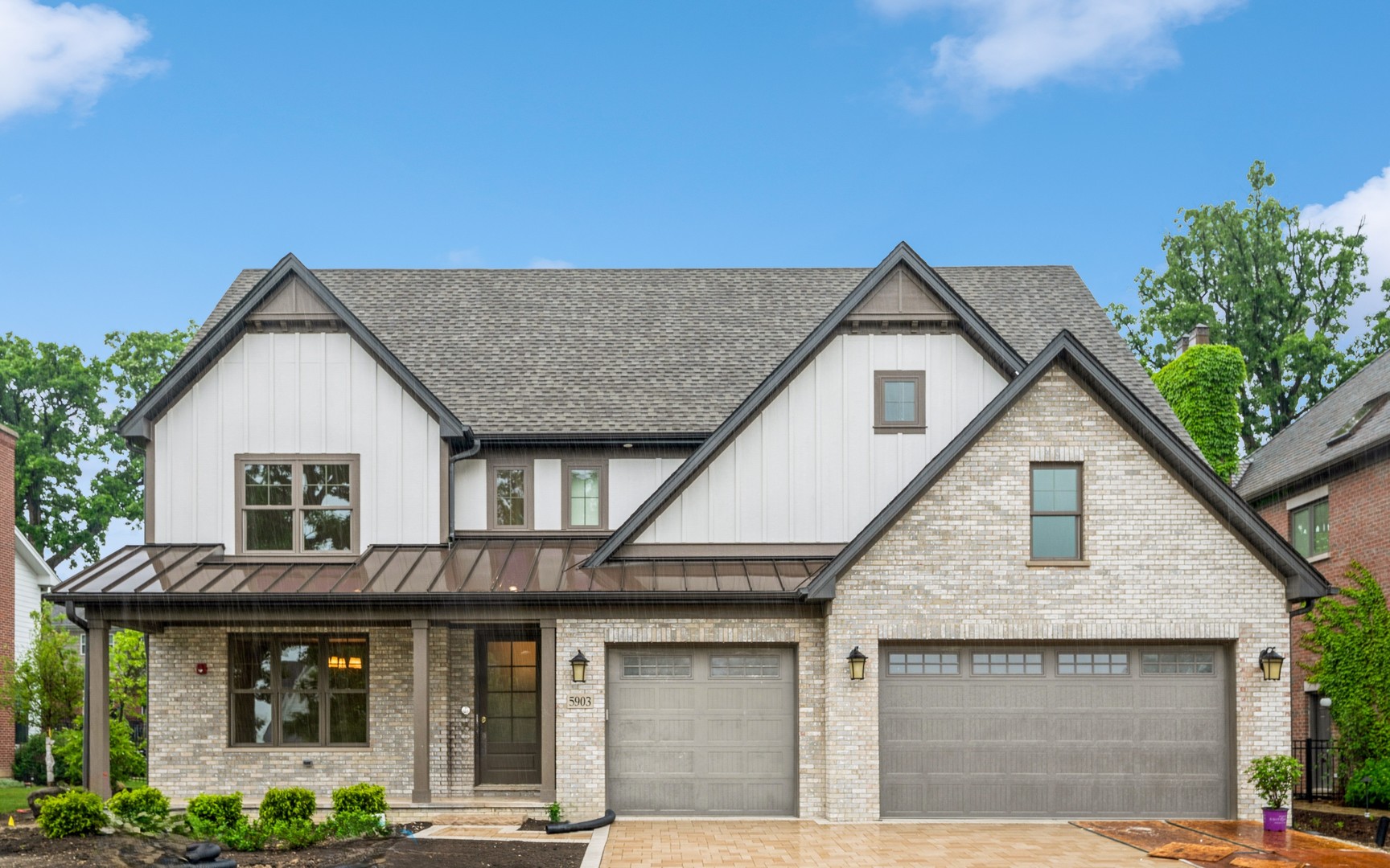5903 Timber Trails Boulevard Western Springs, IL 60558 - Photo 2 of 30 a front view of a house with garden