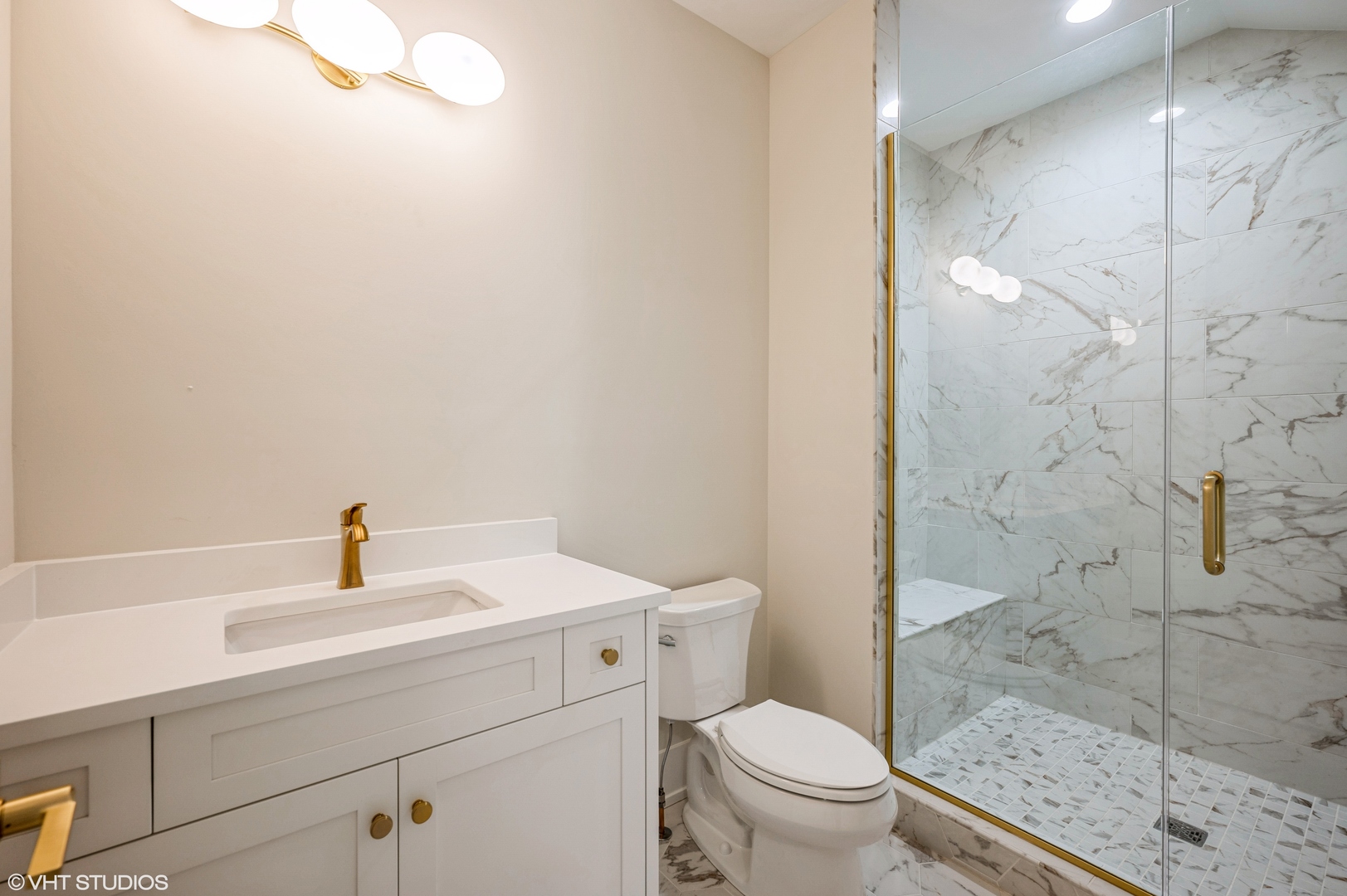 5903 Timber Trails Boulevard Western Springs, IL 60558 - Photo 23 of 30 a bathroom with a sink a toilet and shower