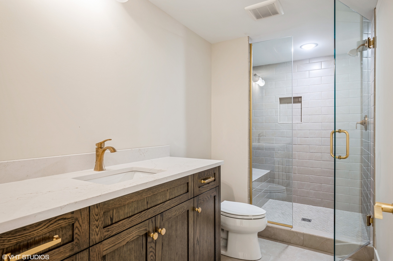 5903 Timber Trails Boulevard Western Springs, IL 60558 - Photo 27 of 30 a bathroom with a sink a toilet and shower