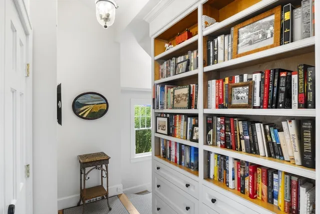 a view of a book shelf with lots of books